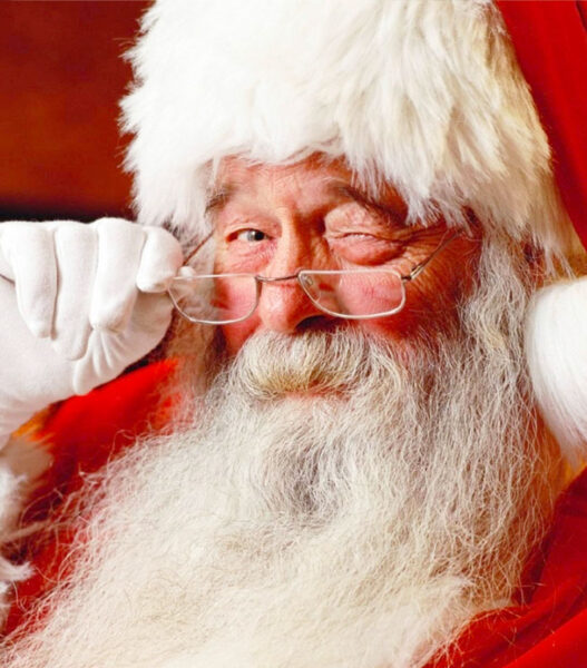 Babbo Natale con bambini che aspettano i regali per Natale