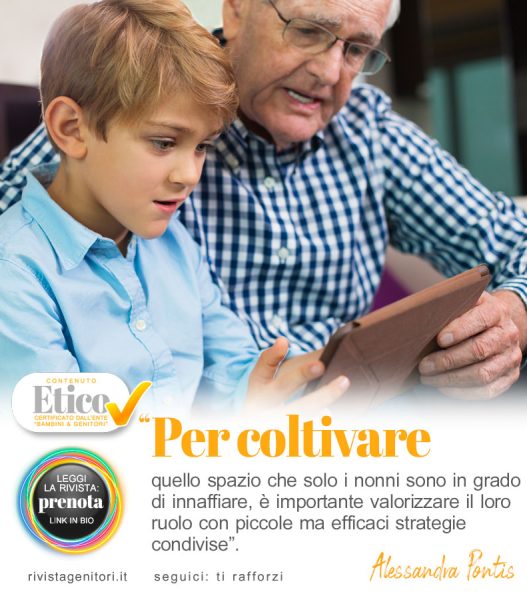 nipote e nonno che giocano insieme serenamente senza tecnologia per rafforzare il legame emotivo